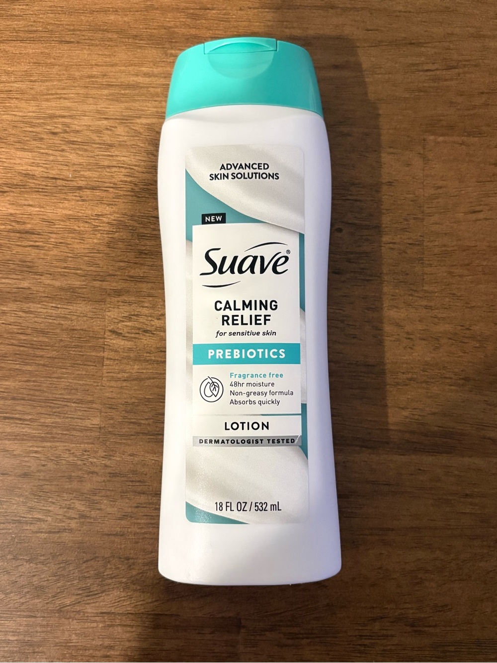 Suave Calming Relief Prebiotics Lotion — White Bottle with Teal Cap